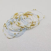 White & Gold Multi-Strand Beaded Bracelet Stack Set