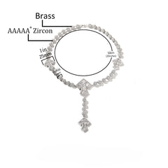 Collier croix perlée