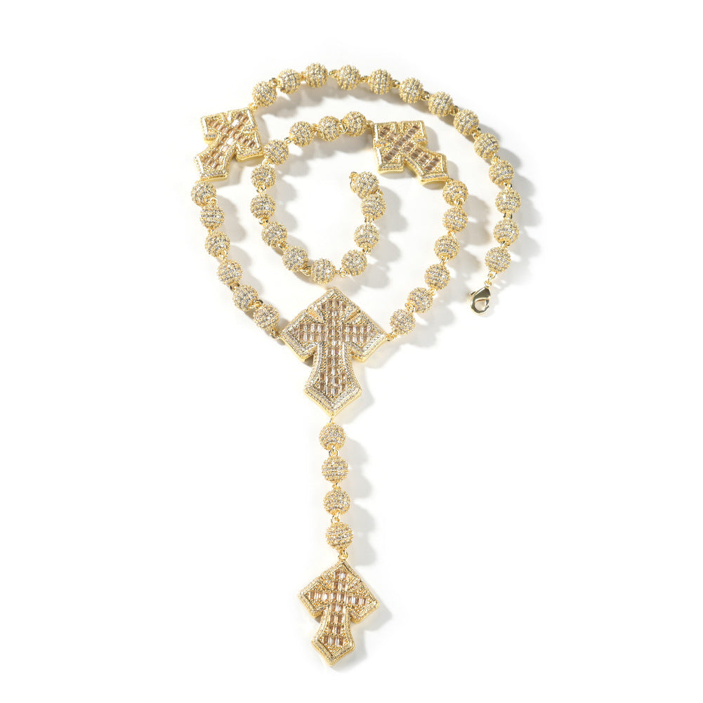 Collier croix perlée